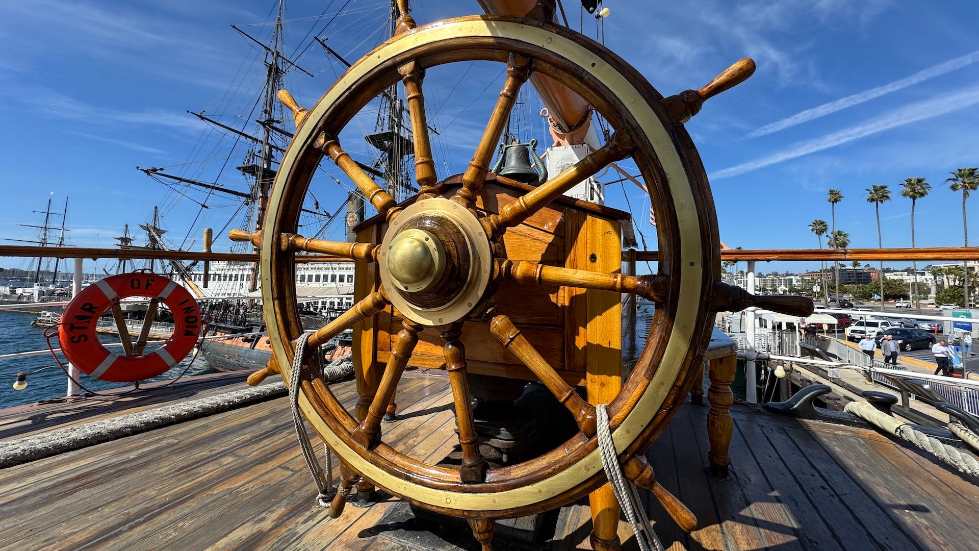 Wooden steering wheel on a wooden ship